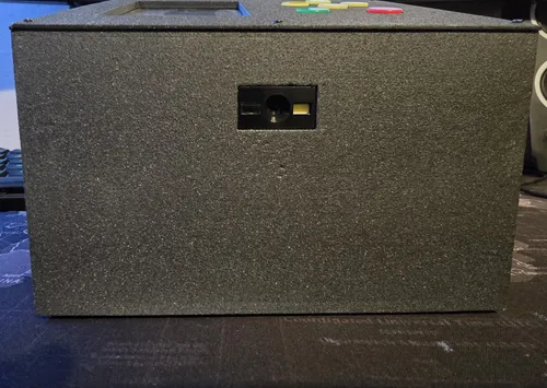Front face of the finished textured enclosure with the barcode scanner window in the middle