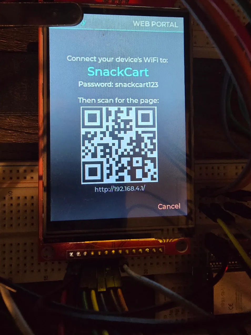 Device screen showing the WiFi network name, password, and a QR code linking to the admin page